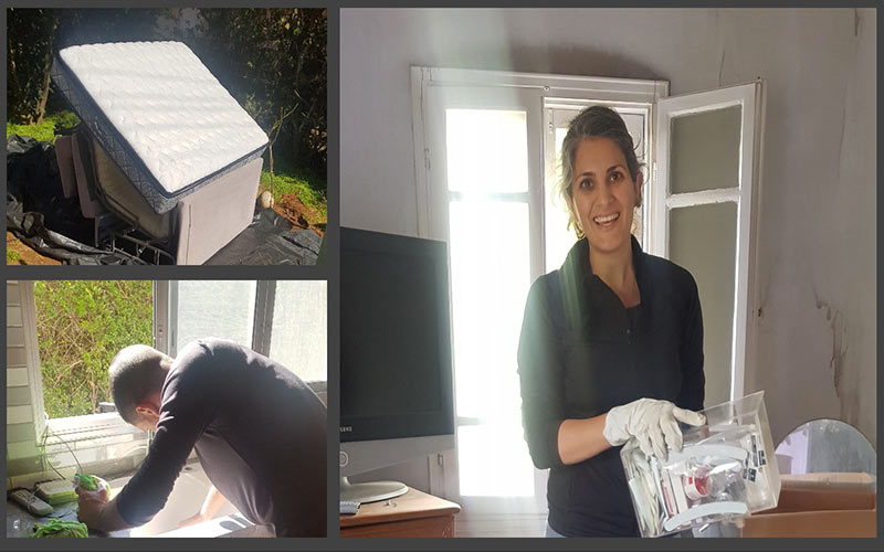 צוות ניקיון אחר לבתים שנשרפו